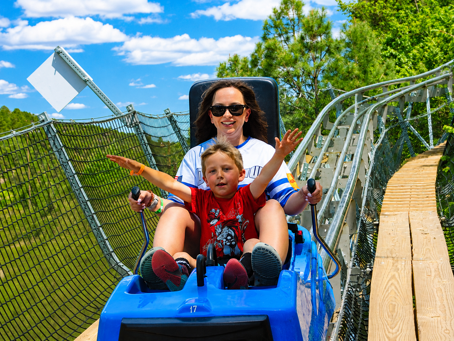Guests riding the Screaming Eagle Mountain Coaster at Ruidoso's Winter Park